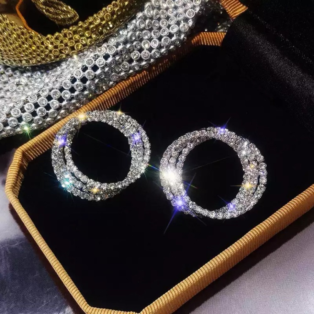 Rhinestone silver‎ tone circle earrings